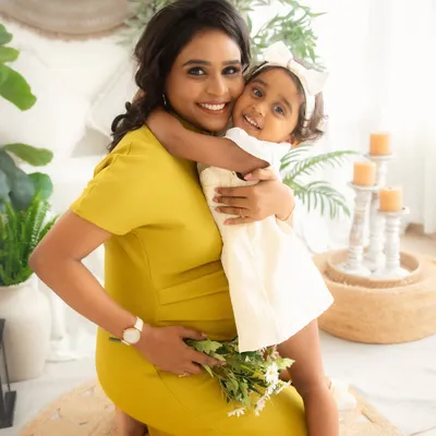 The sweetest hug from a big sister to her mumma. Including siblings in your maternity shoot is a wonderful way to capture the growing bond and make them feel part of the journey.