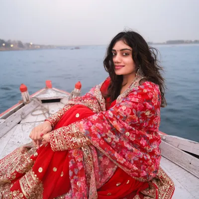 Wrapped in tradition, floating on the Ganga. This portrait captures the timeless beauty and serene vibe of a classic Banaras boat shoot.