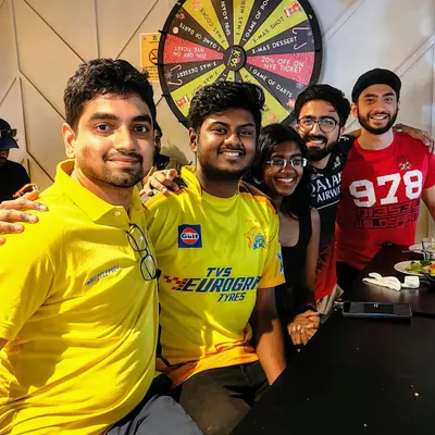 Good vibes and great games, especially during IPL season. These CSK fans are all smiles, enjoying the match with their friends at K-OS.