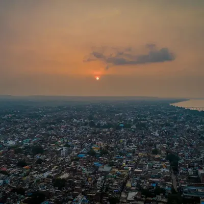 इ हौ हमार Mirzapur. A wide sunset shot over my hometown, showing the dense city and the river in the distance.
