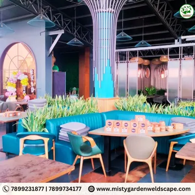 We transformed the outdoor area of Skydeck, a commercial establishment, into a vibrant and refreshing space for customers. The design incorporates lush greenery around the seating areas to enhance the ambiance and overall experience.