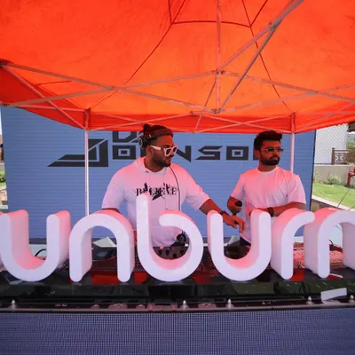 Behind the iconic Sunburn letters at the Holi festival in Jaipur. Performing on a stage like this is an incredible feeling, and I bring that same festival energy to every gig I play.