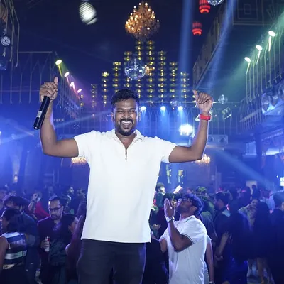 Mic in one hand, party in the other. As an MC and DJ, I interact with the crowd, make announcements, and ensure the energy level is always at its peak throughout the night.