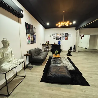 Our studio lounge is a space to unwind and connect after class. We designed this cozy corner for our community to relax, share stories, and continue supporting each other off the mat.