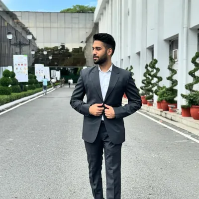 A professional portrait in a business suit. My approach to law is forward-looking, combining traditional legal principles with a modern, strategic mindset.