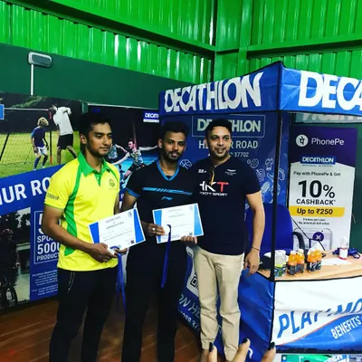 Presenting certificates to winners at a tournament hosted at my academy. I enjoy partnering with brands like Decathlon to create exciting events for the badminton community.
