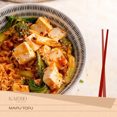 My Mapo Tofu is a vegetarian showstopper. I use house-made silken tofu and fresh greens like bok choy, all tossed in a rich and spicy Sichuan sauce.
