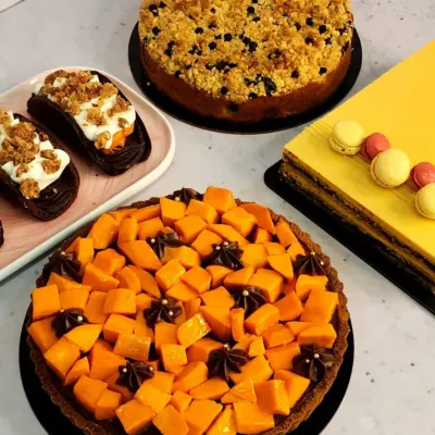 A glimpse of May at The Baking Gurl, which means it's all about mangoes! This spread features my mango tart, mango opera cake, and other mango-infused desserts.