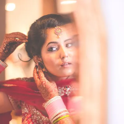 A quiet moment of reflection for the bride before the ceremony begins. I ensure my brides have a calm and stress-free environment to get ready in.