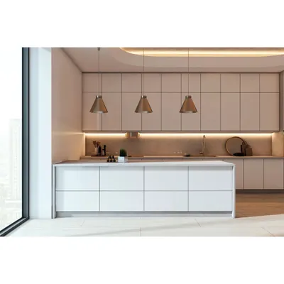 This bright and minimalist modular kitchen features handleless white cabinets and a large island, creating a clean and uncluttered look. We used under-cabinet and recessed ceiling lighting to ensure the space is both beautiful and perfectly illuminated for cooking.
