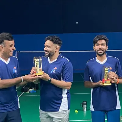 Members of our "Team Avengers" receiving their trophies after a competitive tournament for adult players held at our facility.