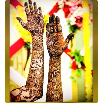The letters 'ZN' for the bride and groom are woven right into the fabric of this full bridal design. This is my favorite way to make your henna truly one of a kind.