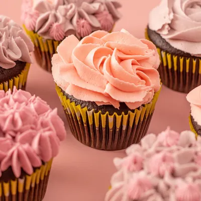 No words needed, these treats speak for themselves. My Belgian chocolate cupcakes are topped with irresistible vanilla buttercream frosting, perfect for brightening up any day.