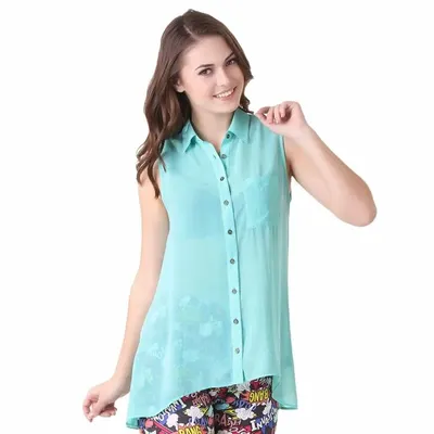 A female model wearing a sheer, sleeveless turquoise top against a clean white background, ideal for e-commerce product pages.