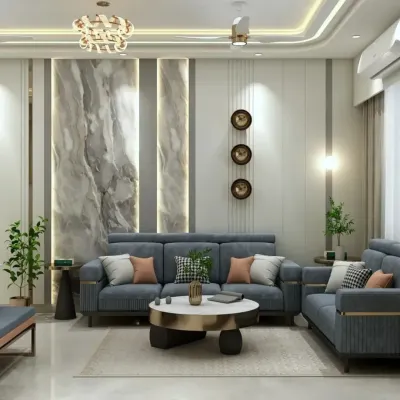 A luxurious living room featuring a grey marble-patterned accent wall with integrated vertical lighting. The plush blue sofa set and gold-accented coffee table create a sophisticated space for entertaining.