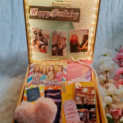 My 'bestie edition' birthday hamper box, all lit up! It's filled with a photo collage, a mini album, a framed quote, and other fun treats.