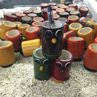 Our owl-themed pen holders are a popular choice for office and home decor. Available in a variety of rich, organic colors, they add a touch of handcrafted charm to any desk. Each piece is turned from a single block of wood.