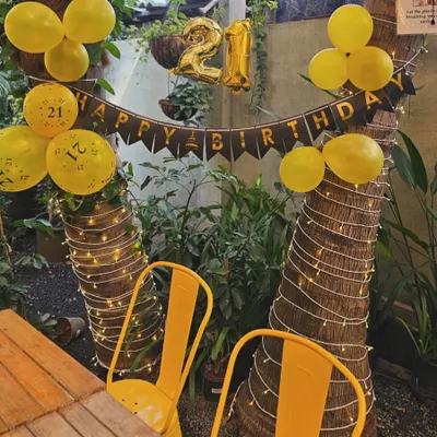 Celebrate your special moments with us. We decorated this corner for a 21st birthday, and the combination of balloons and our fairy-lit trees created a magical atmosphere. Let us know your theme, and we'll help you set the vibe.