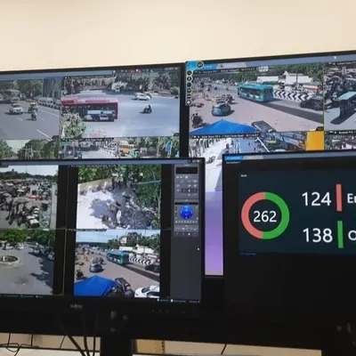 A complete monitoring station setup for a commercial client. This system tracks over 260 cameras, with a dedicated screen showing the online and error status to ensure the security network is always running.