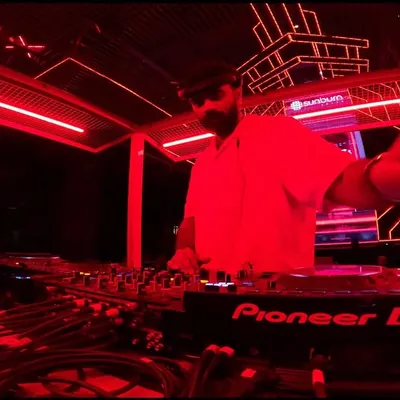 A dynamic, wide-angle shot from the DJ booth at Sunburn Union Bangalore. The intense red lighting and futuristic setup show the premium club environment I perform in.