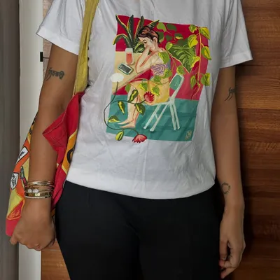 A full-length view of the printed t-shirt featuring my 'A Moment of Rest' illustration. The design is placed centrally for a clean, artistic look, perfect for pairing with casual outfits.