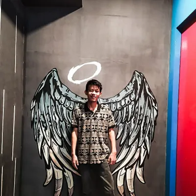 Here's one of our artists, Balu, showing how our angel wings mural at Westeros in HSR creates the perfect photo opportunity. It's an instant engagement booster for any pub or cafe.