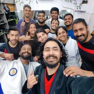 A great selfie capturing the smiles after a tough but rewarding training session. This is the essence of our community.