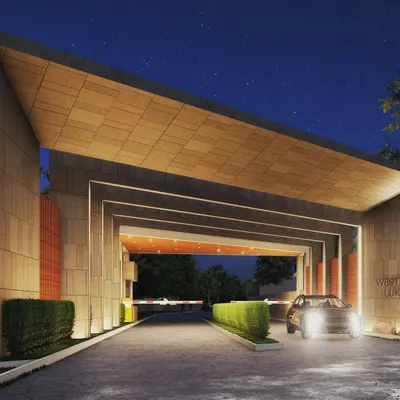 A night view render of the 'Westend' community gateway in Meerut. The design uses tapered portals and integrated lighting to create a modern and luxurious entrance.