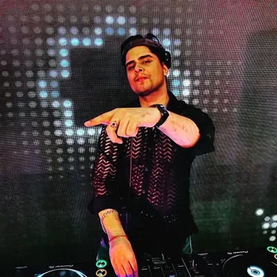 You know it's about to be a banger when I'm on the console. A shot from a private event where I was in my element, ready to get the party started.
