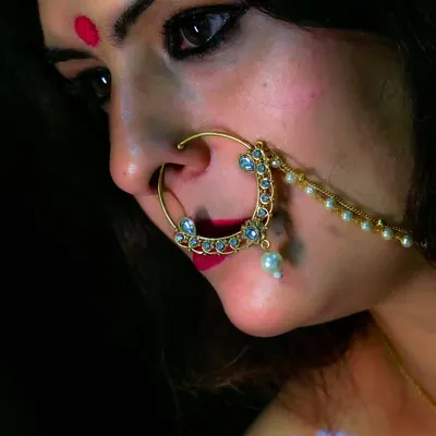 A close-up on a traditional bridal nose ring (nath). I believe that the right piece of jewelry can elevate an entire look and tell a story of its own.