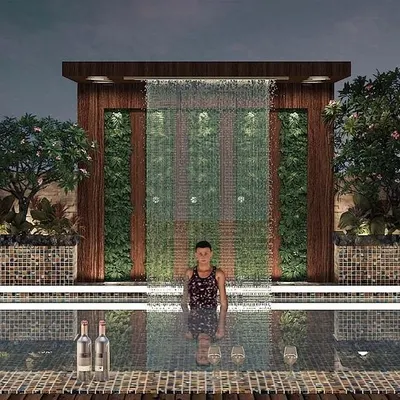 A closer look at the infinity pool we designed for a Lonavala terrace, overlooking the hills. The rain curtain adds a dynamic visual and sensory element, while the surrounding planters and wood accents integrate the pool with the landscape design.