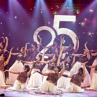 A powerful moment from Prayaan 2023. Our entire troupe on stage, showcasing a beautiful semi-classical Bollywood performance with synchronized poses and stunning costumes.