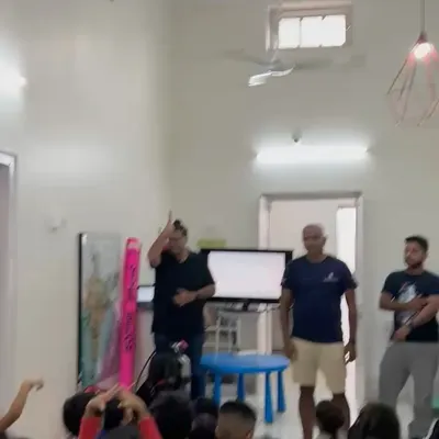 It's always a joy to share our passion for the ocean with young minds. Here, we're at a school, teaching kids about marine life and the basics of scuba diving.