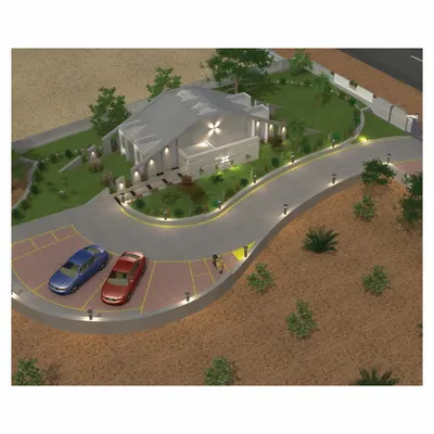 An aerial 3D render of the Pechimuthu Memorial near Tuticorin. The design features a tapered form set within a tranquil, landscaped environment with dedicated parking, creating a peaceful retreat for visitors.