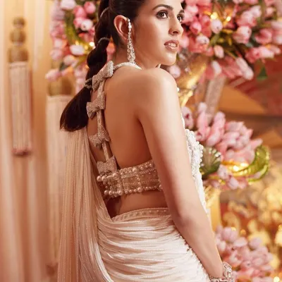 A close-up of the stunning back of the custom Tamara Ralph saree. The bow details and intricate beading are what make this piece so special and couture.