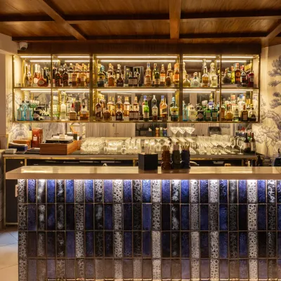 Our indoor bar, fully stocked with a wide selection of spirits and liqueurs, where our bartenders craft both classic and innovative cocktails.