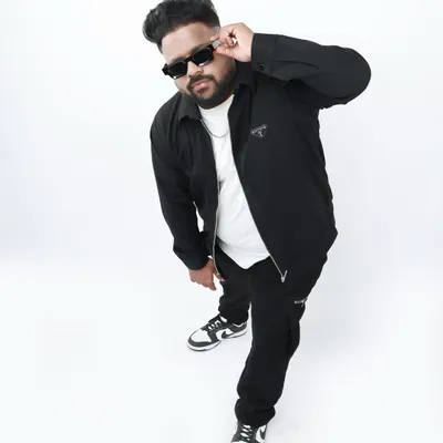 Crafting the right sound starts with the right vibe. This is a shot from one of my studio photoshoots, capturing the energy I pour into every custom music production.