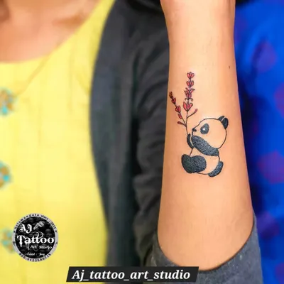 A cute and clean panda tattoo on the forearm. I enjoy doing these charming animal designs.