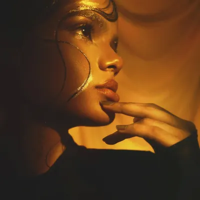 A close-up of the golden dynasty look. I used gold leaf and graphic shapes to create a look that feels both ancient and futuristic, perfect for a high-fashion editorial.