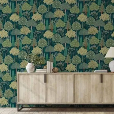 This is the kind of transformation I love to see. A high-quality botanical wallpaper from my collection turns a simple wall into a sophisticated and serene feature. This design, with its detailed trees on a deep teal background, is perfect for living rooms or bedrooms.