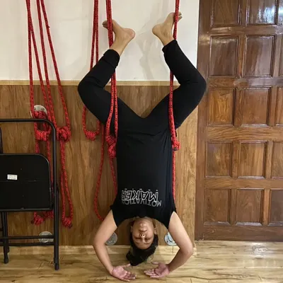 Using the wall ropes for Shirshasana (Headstand) is a game-changer. The ropes provide security and help with alignment, allowing you to hold the pose longer and build confidence upside down.