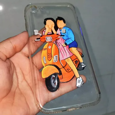 A finished custom phone case featuring a faceless portrait of a couple on a scooter. I painted this directly onto a transparent case, creating a unique accessory from a client's photograph.