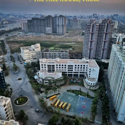 A clear aerial shot of the Tree House High School campus in Virar. This image is perfect for an institutional portfolio, showing the school building, playground, and surrounding neighborhood in a single, informative view.