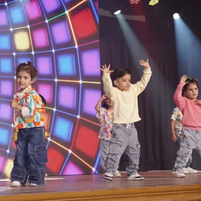 Our toddlers taking their first steps on stage. These classes are all about building confidence, learning basic rhythm, and having a great time in a supportive environment.