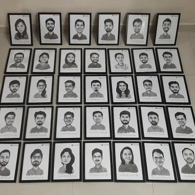 A large batch of our classic black and white caricatures, framed and ready for a corporate client's festive gifting.