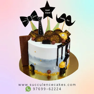 This cake was designed to celebrate all the roles a man plays: a caring brother, a good friend, and a loving son. The theme is brought to life with custom toppers, chocolate bars, and a stylish blue-grey watercolor effect.