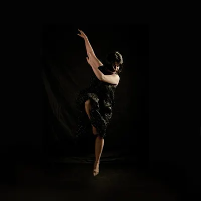 This performance shot from 'Quest' embodies the production's goal: to tell untold stories with grace and power. As a choreographer and performer, my focus is on creating evocative visuals that connect with the audience on an emotional level.