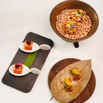 A playful prelude to the Indian Accent experience. Here, you see our dhokla bites, chaat canapés, and kothimbir vadi, each a familiar flavour thoughtfully reimagined with clever textures and surprising pairings.