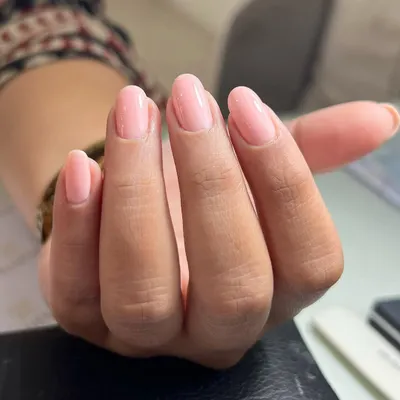 This is a perfect example of a clean Russian manicure. The focus here is on precise cuticle work and flawless application of a single color. The result is incredibly neat, making the natural nails look healthy and perfectly shaped.