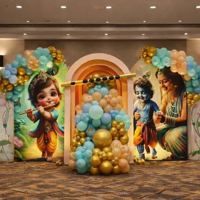 This grand Bal Krishna themed stage is one of our signature designs. It features detailed character cutouts, a central arch filled with balloons, and lotus flower motifs, all coming together for a truly divine naming ceremony backdrop.